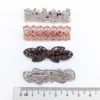 2ada97310b1acb7e65b506a9459310e4-1.webp Mixed Shoulder Brooch - Set of 2